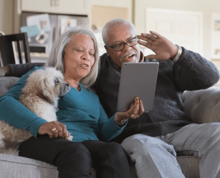 Elderly couple viewing tablet
